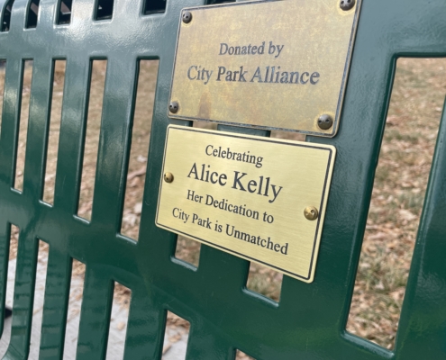 Park bench with plaque