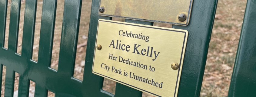 Park bench with plaque